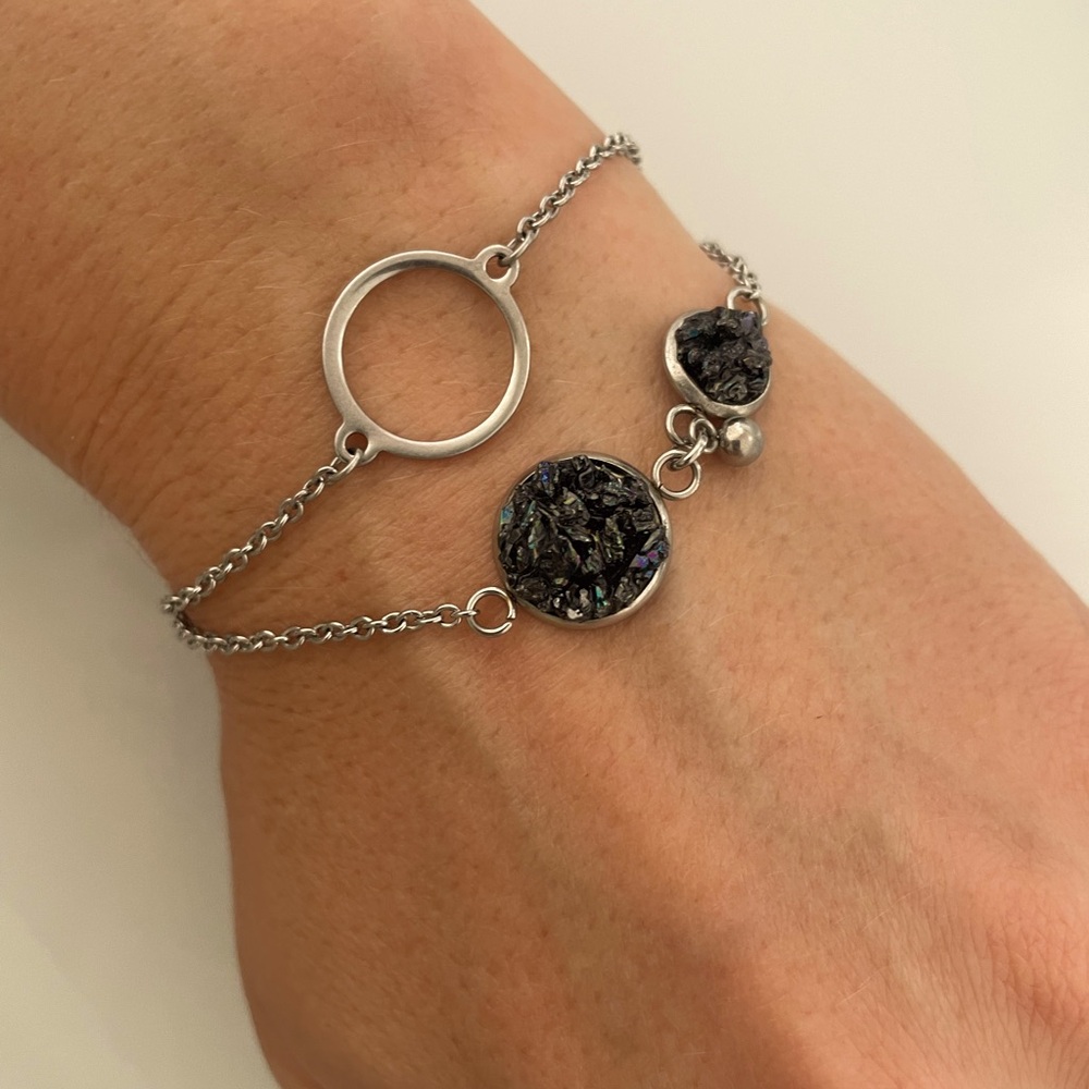 Silver bracelet with black stones